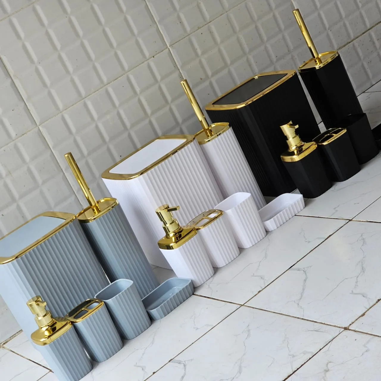 6 in 1 bathroom accessories set with gold ring.