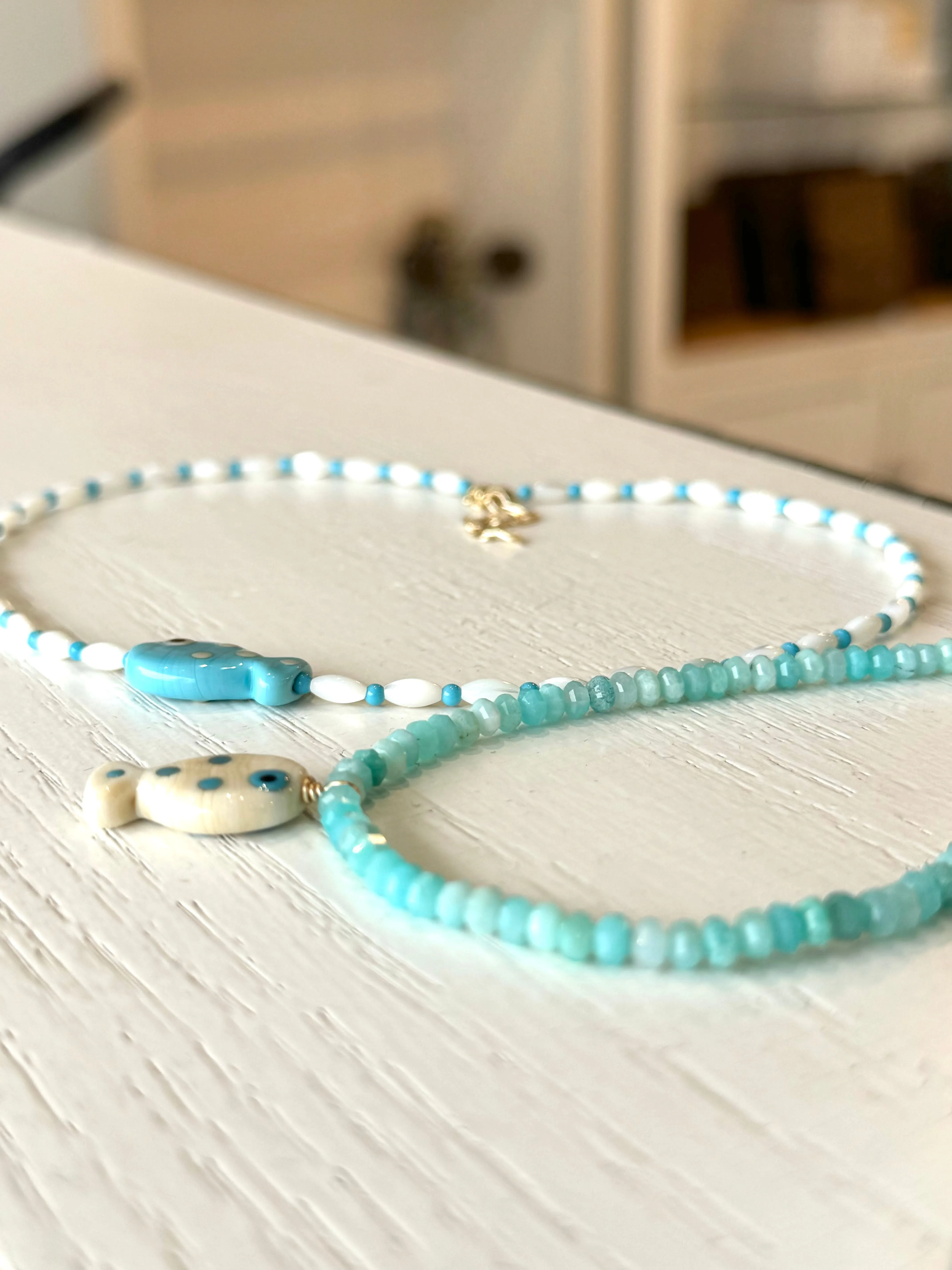 MOTHER OF PEARL/TURQUOISE FISH NECKLACE